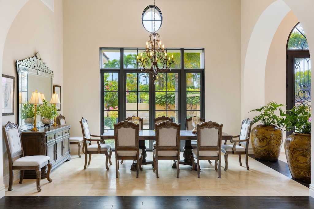 Elegantly appointed dining space with a tropical view.