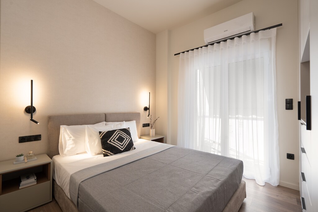 Sink into the calming neutral tones of the bedroom, thoughtfully designed for ultimate relaxation. 