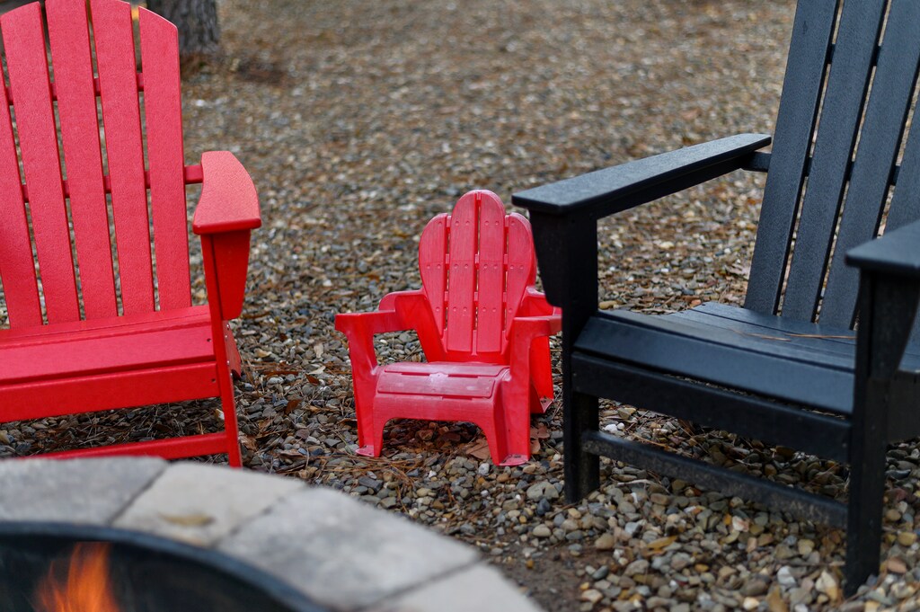 Thoughtful additions of kid friendly adirondacks around the firepit