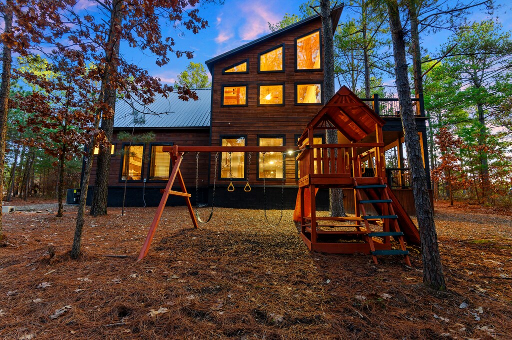 The kids will love the playset just off the back deck.