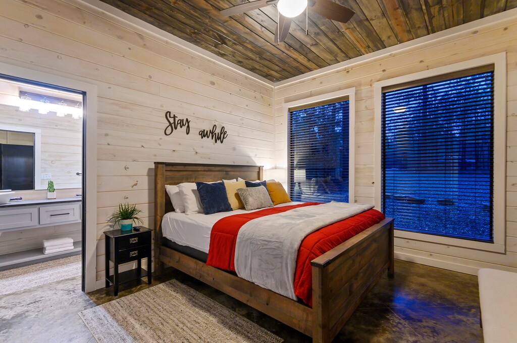 King bedroom with blinds - its vacay, sleep as late as you want