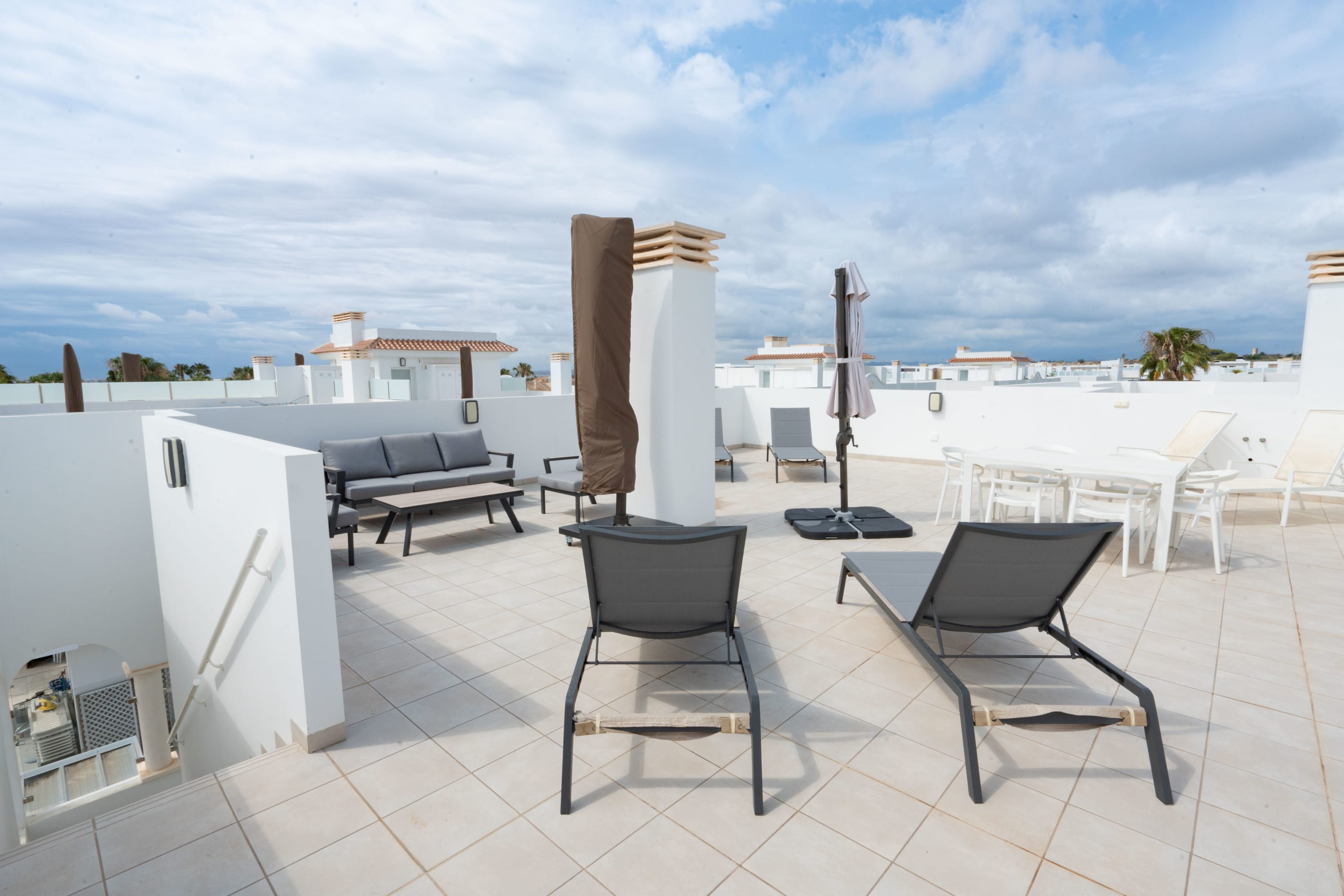 Apartment Terrace with Seating Area, Sun Loungers and Sun Umbrella