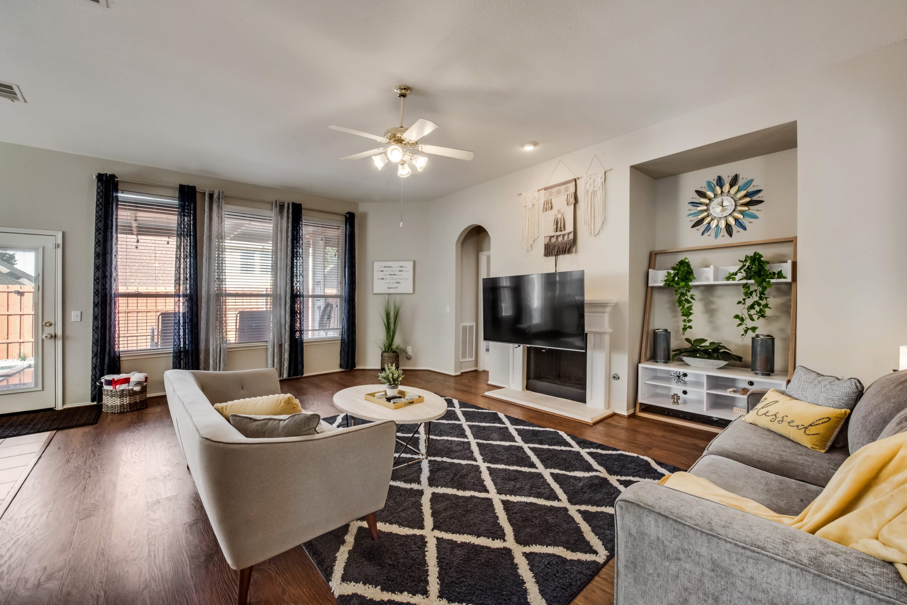 Thoughtful designer elements and sleek modern furniture in this curated living room create a relaxing upscale atmosphere for you to sit back and relax in.