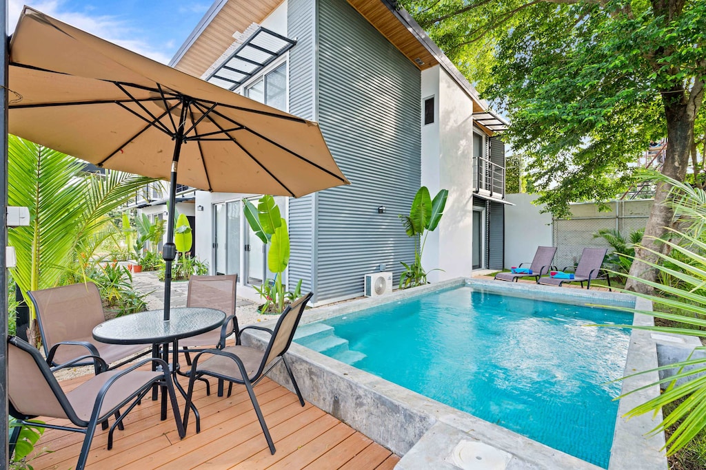Community Pool with Seating Area
