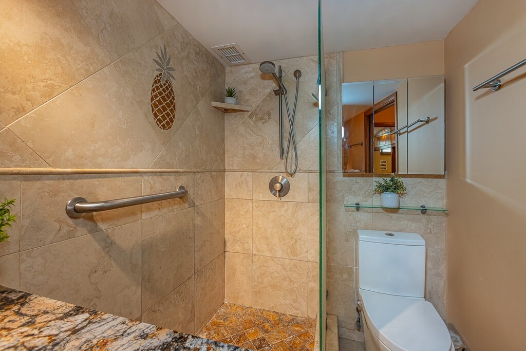 Bathroom features a walk in shower