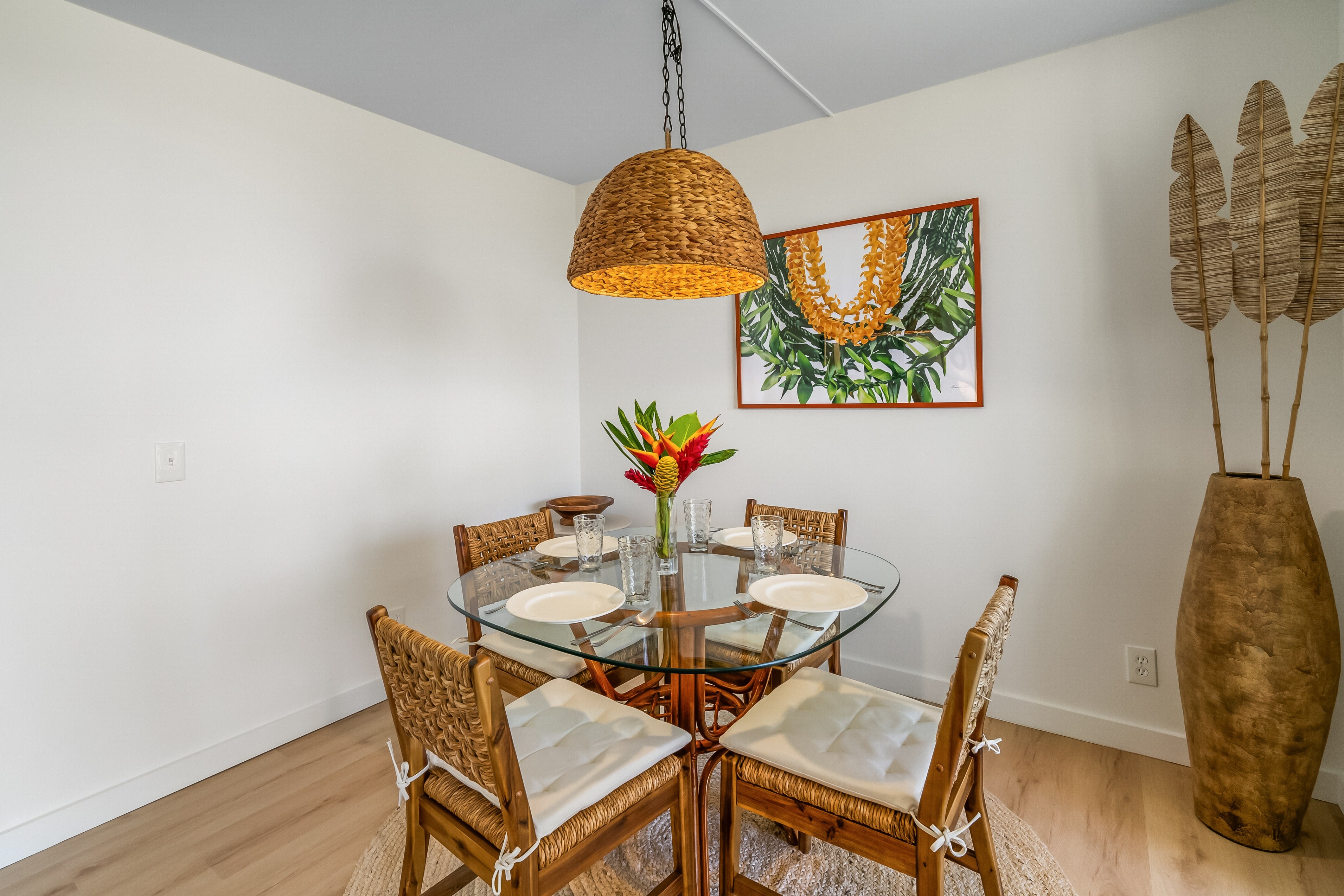 Gather your loved ones in our inviting dining room, where comfort meets island charm.