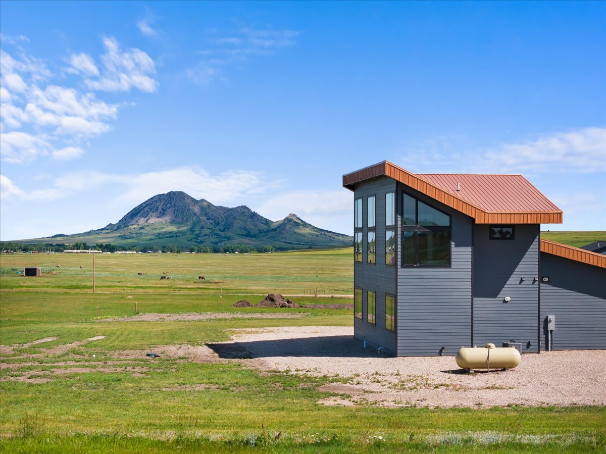 A view out of lofty windows will reveal a breathtaking expanse of black hills countryside surrounding Bear Butte, the namesake of your temporary home