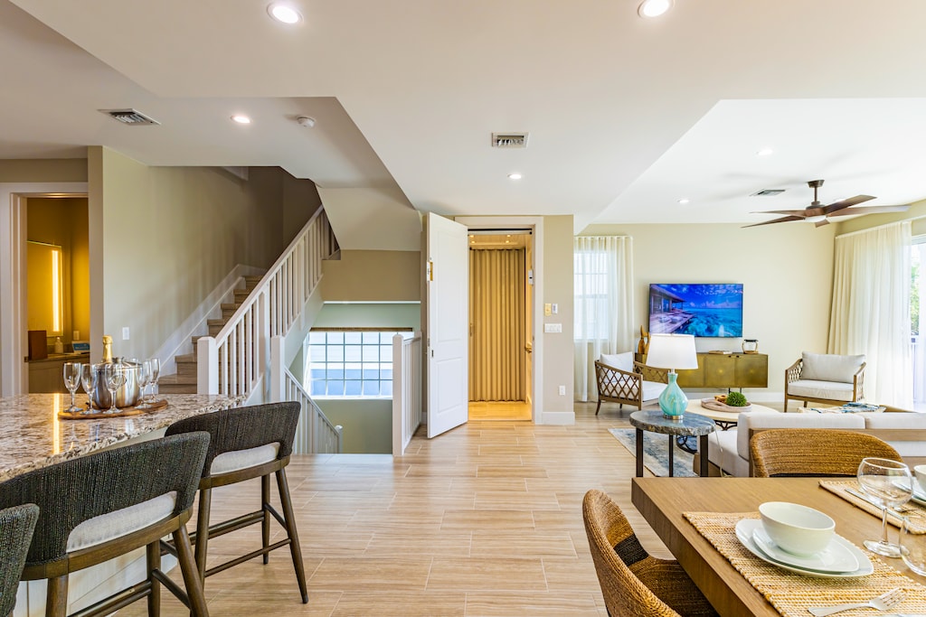 Comfortable open floor plan with a breakfast bar, dining area, and cozy living space.