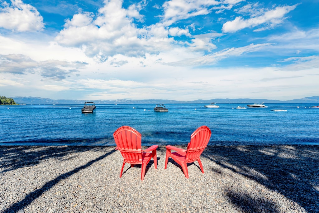 Directly across the street from the lake.