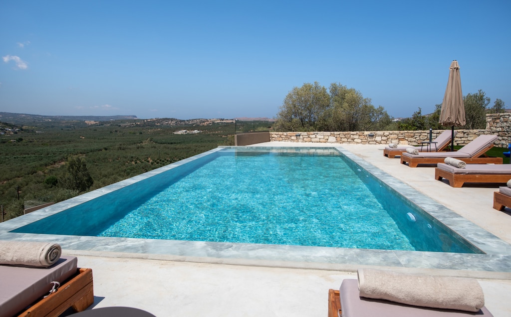 Experience an oasis with breathtaking views and exquisite architectural design at Calmo Villas.