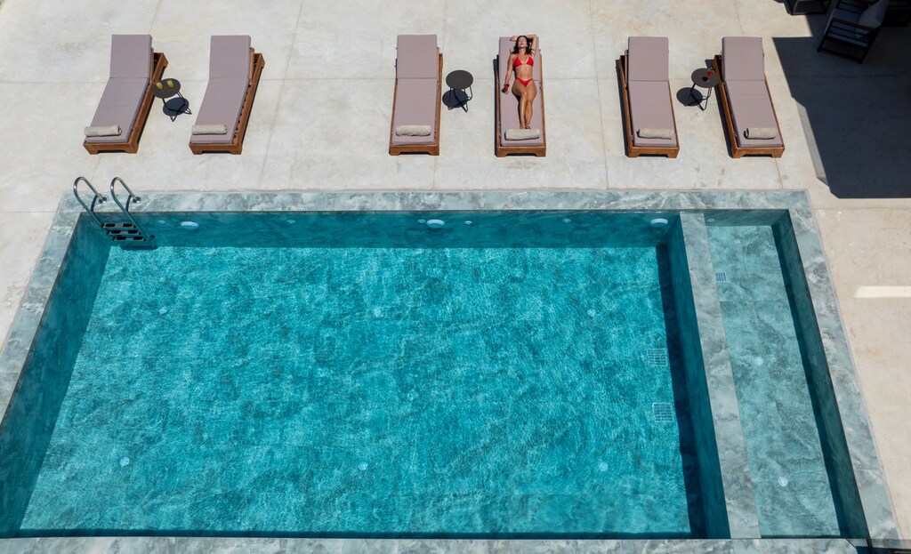 Sophisticated pool surroundings offering a sense of tranquility. 