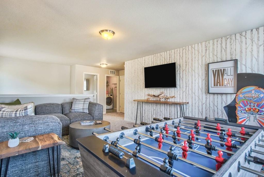 Game On! Unwind in our family game room with comfy couches and a variety of fun games. Ready for some good times?.