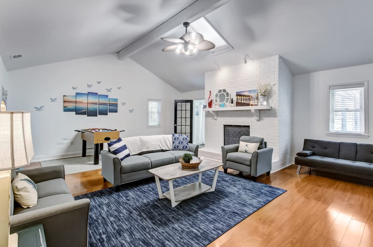 Living Room with vaulted ceilings and comfy seating!