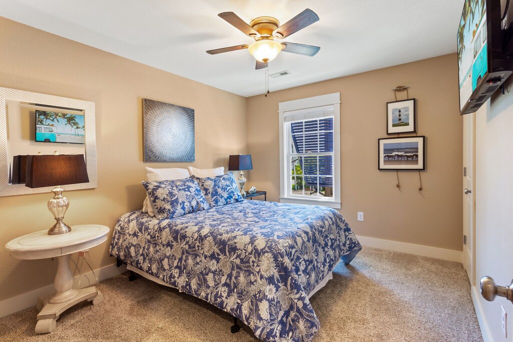 A Queen Bedroom offers even more cozy space to relax.