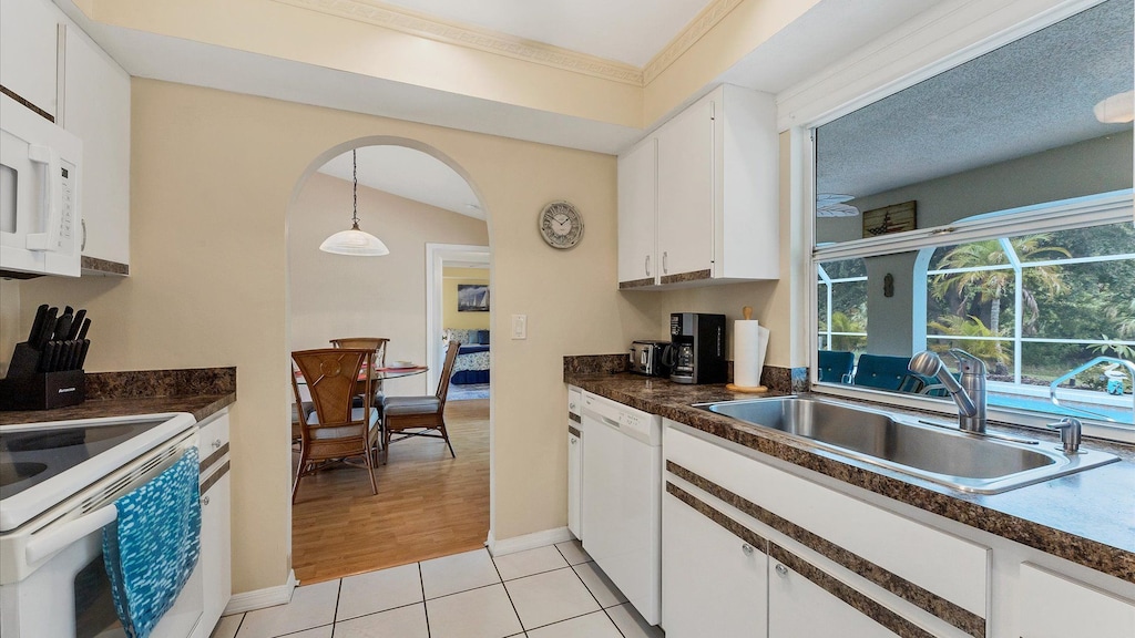 Spacious galley kitchen overlooking the pool