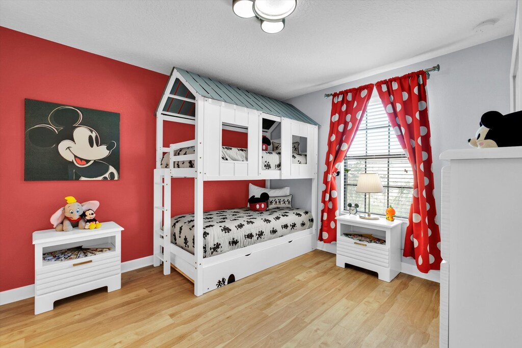 Twin/Twin Bunk + Twin Trundle Bedroom 3 Upstairs
Shared Bathroom
Mickey Theme