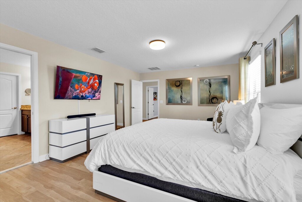 Master King Bedroom 1 (Angle)
55" Roku TV