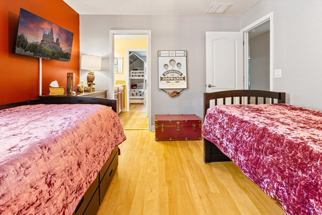 Two Twins + Twin Trundle Bedroom  4 (Angle)