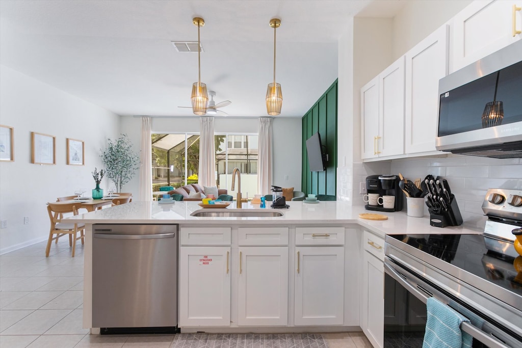 With a wide, open view from the kitchen to the living room, it's easy to chat, laugh, and stay connected with family