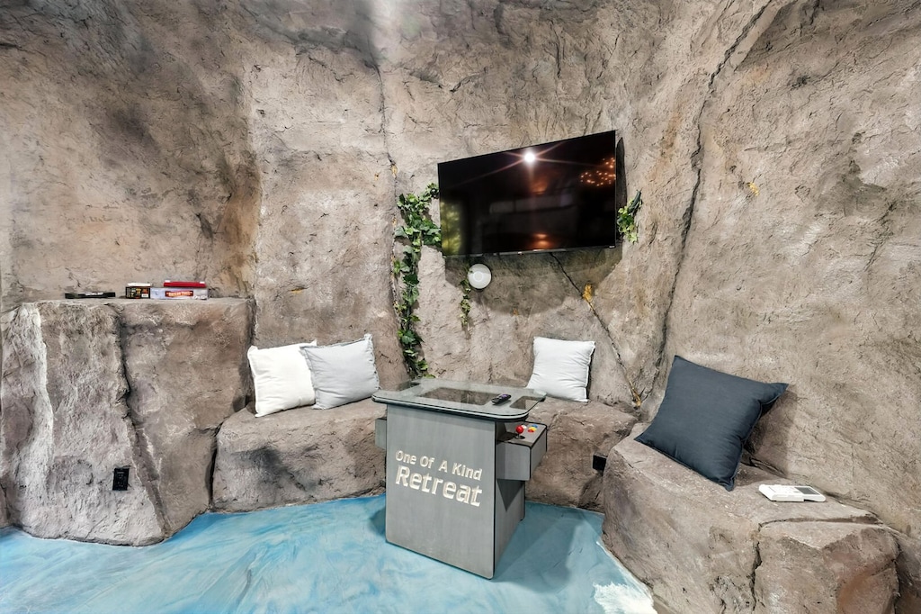 Arcade game in cave room