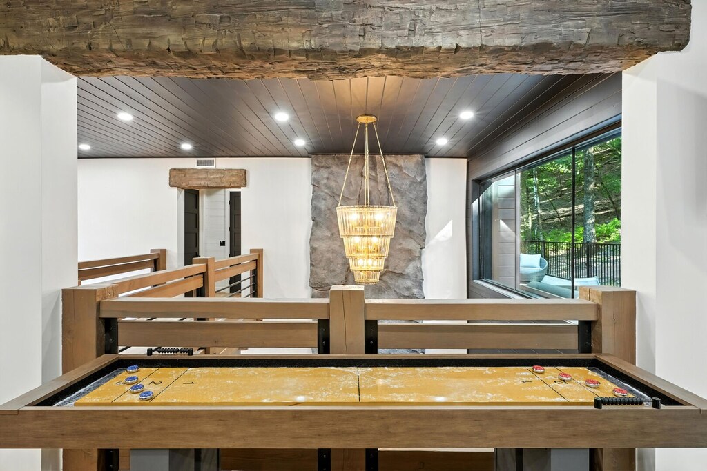 Shuffleboard table upstairs in game area