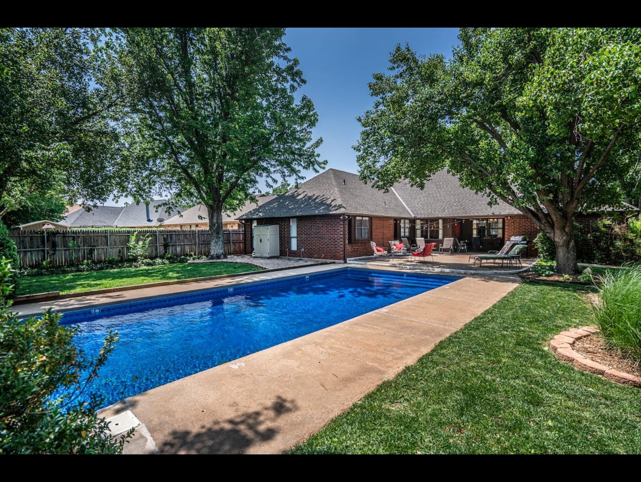 Property Image 1 - Spacious Retreat with Shaded Yard & Games