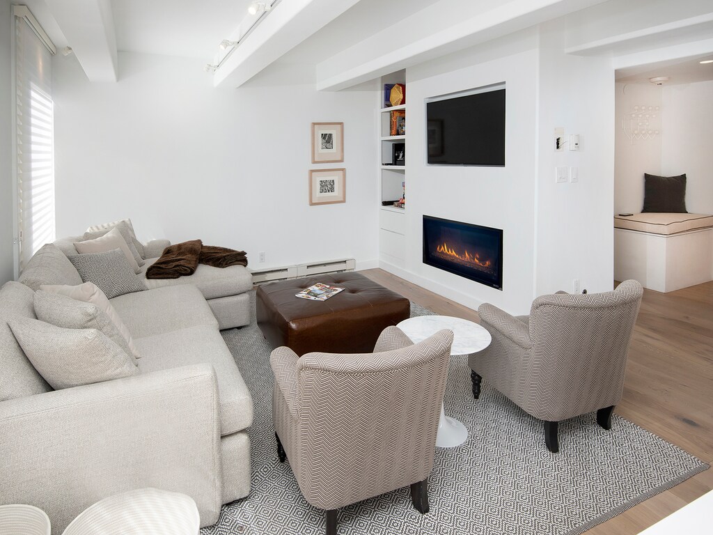 Living Room w/ Fireplace & TV