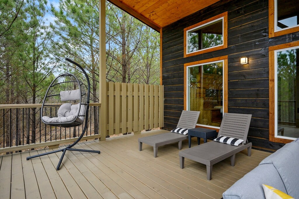 Upper deck has multiple seating areas and a TV