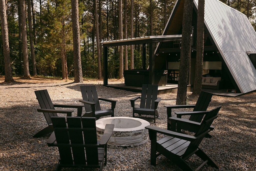 Outdoor area with hot tub and fire pit