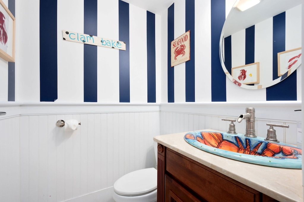 Convenient half bathroom located near the lower level recreation space and door to the pool patio - 14 Hallett Lane Chatham Cape Cod - Sand Simeon