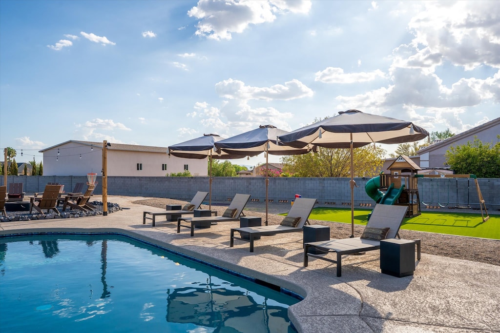 Our private pool, cozy poolside loungers, and inviting outdoor firepit create the ultimate retreat for relaxation and enjoyment.