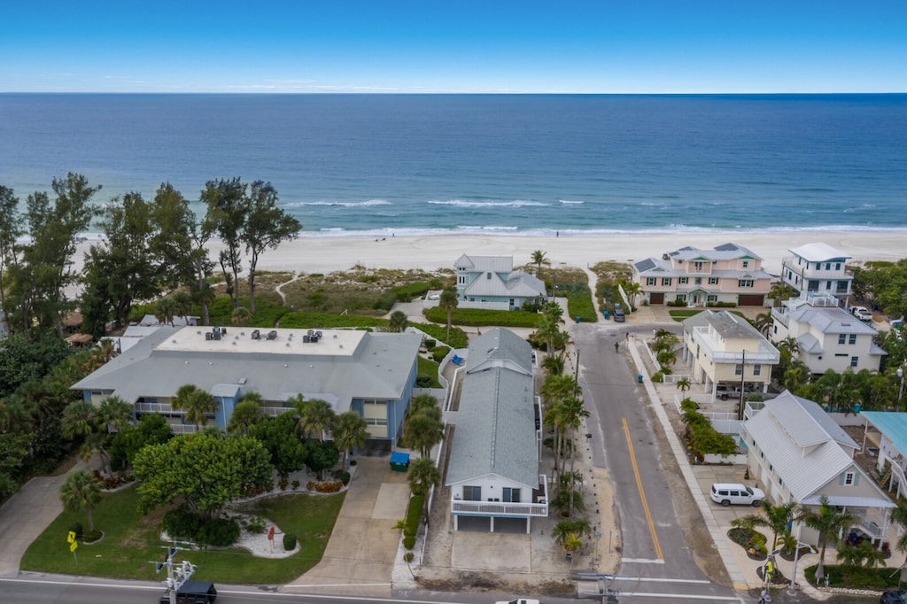Aerial - Walk outside right to the beach!