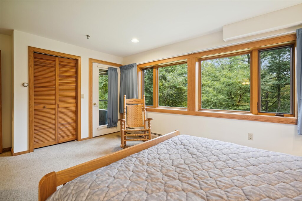 Quaint, spacious queen bedroom.  Large windows to bring in lots of natural light