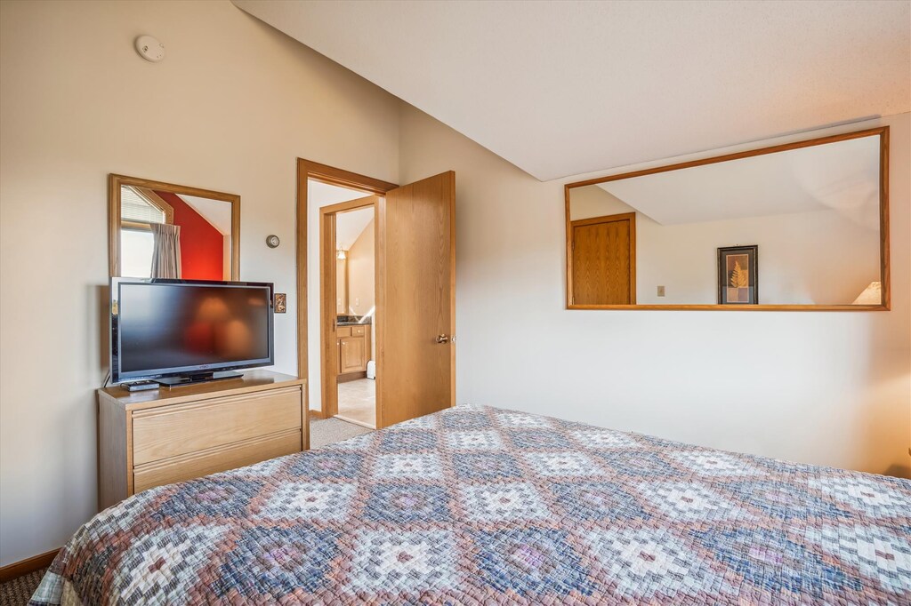 Enjoy watching the flat screen TV.