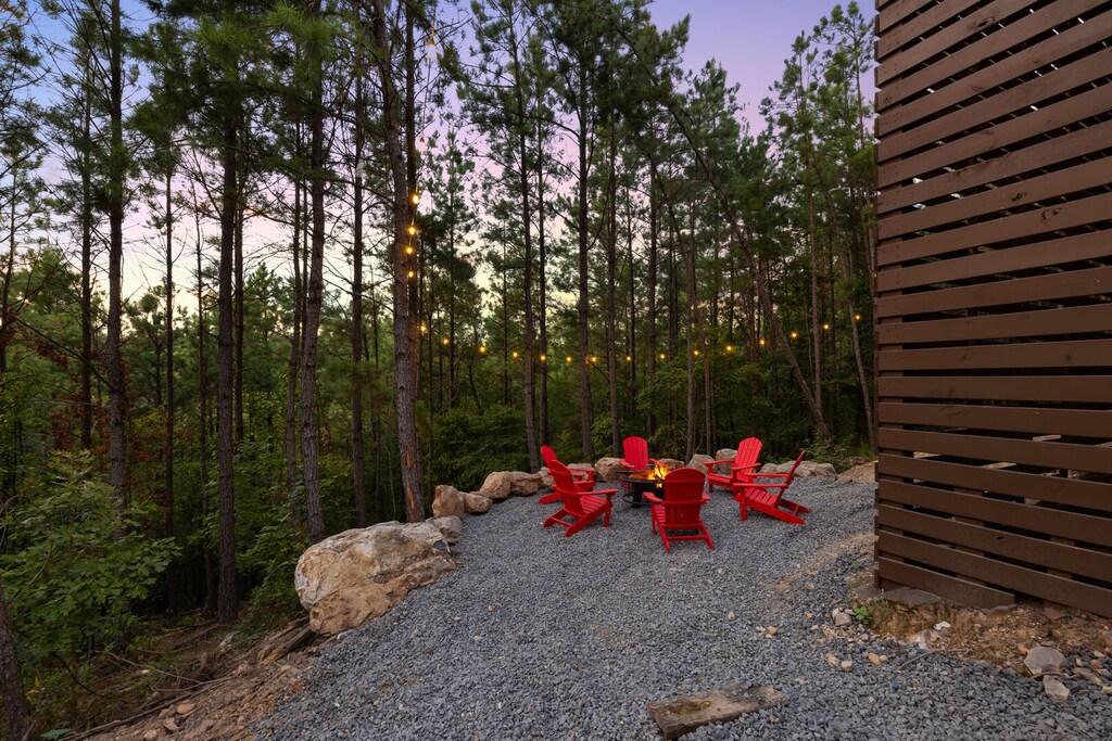 Fire pit on side of cabin