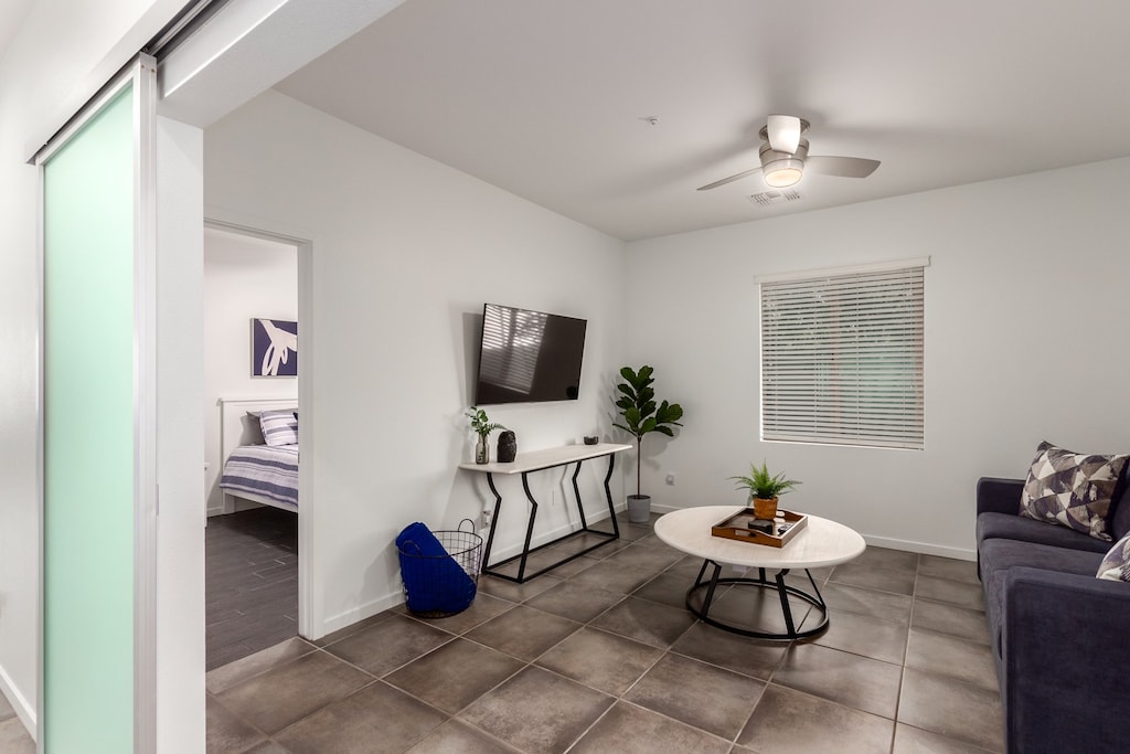 Separate Living area between the two guest bedrooms equipped with a TV