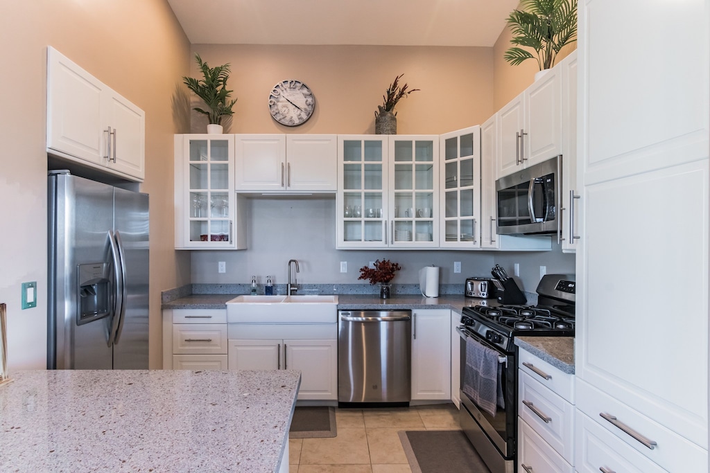 The spacious kitchen includes everything you need to make a favorite meal. Some extras included are the waffle maker and an air fryer!