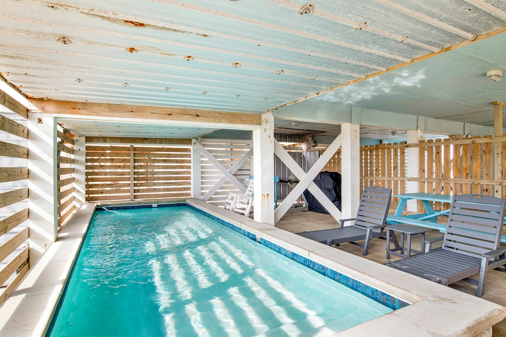 Private pool under the home that can be heated during the cooler months