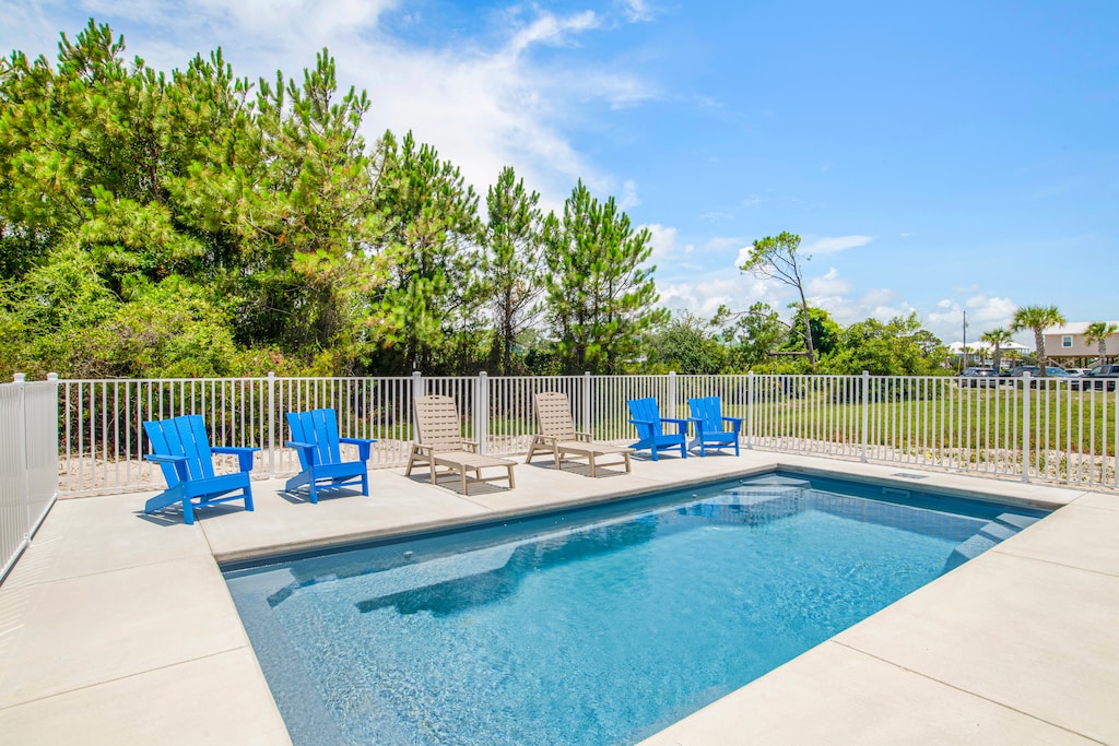 Private fenced pool that can be heated during the cooler months