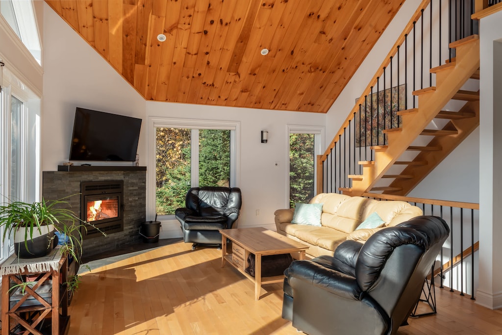 Warm and inviting space with vaulted ceilings and natural light 