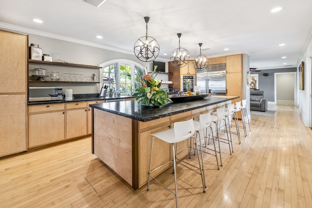 Spacious kitchen island for meal prep, casual dining, and entertaining.