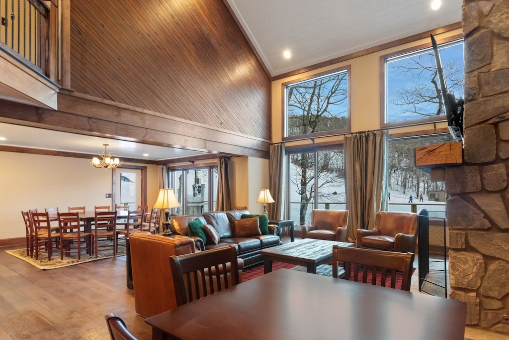 Open Floor Plan With Wall of Windows Overlooking the Slopes