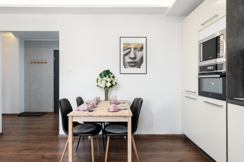 Cook and dine in style with the modern kitchenette and dining area.