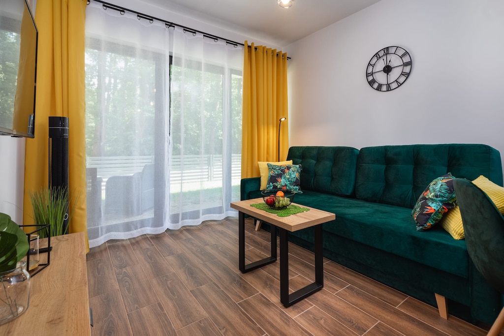 Watch your favorite shows on the flat-screen television in the elegant living area.