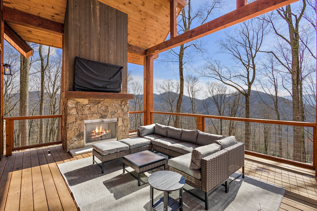 Covered Outdoor Living Area with Gas Fireplace and TV