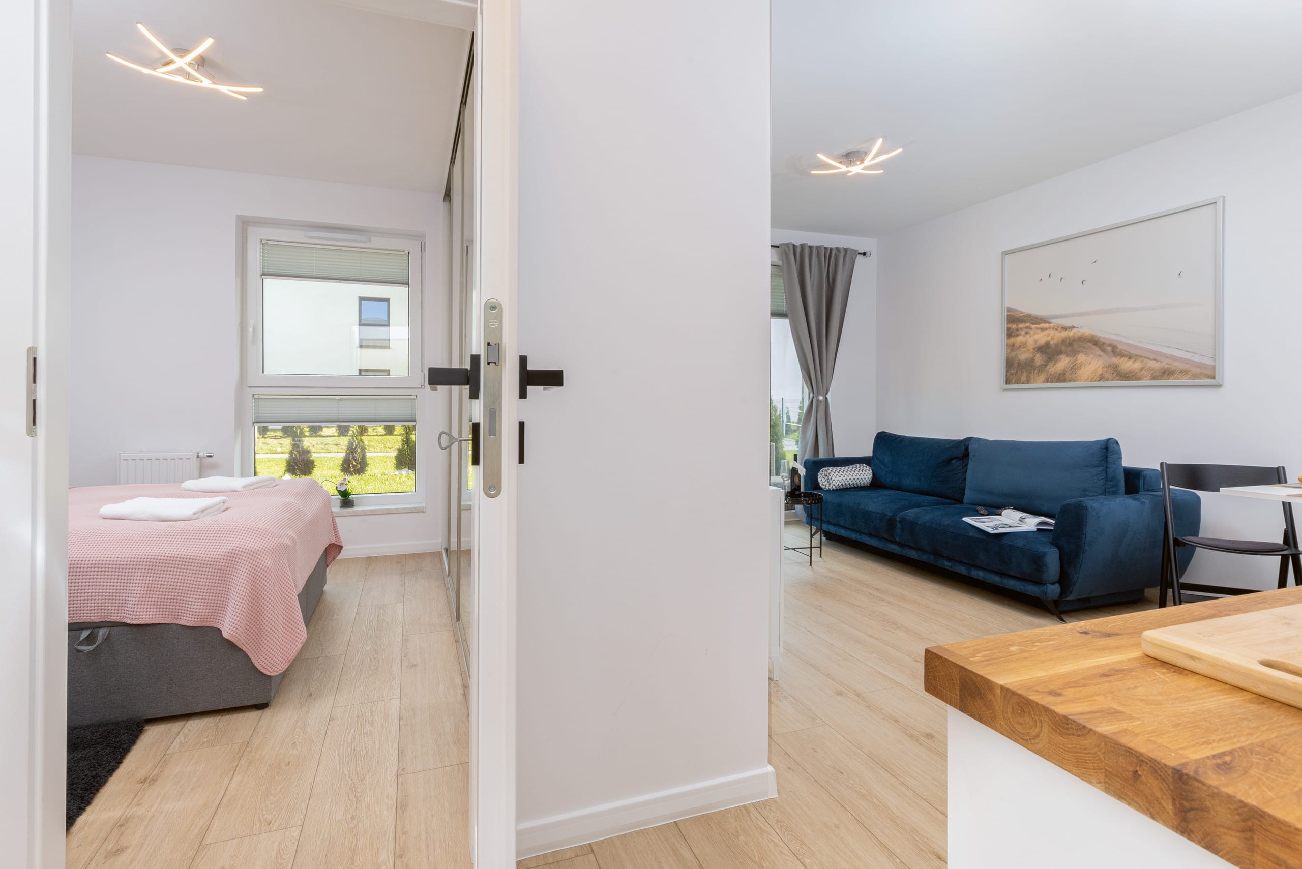 View from the kitchenette to the entrance to the living room and bedroom.