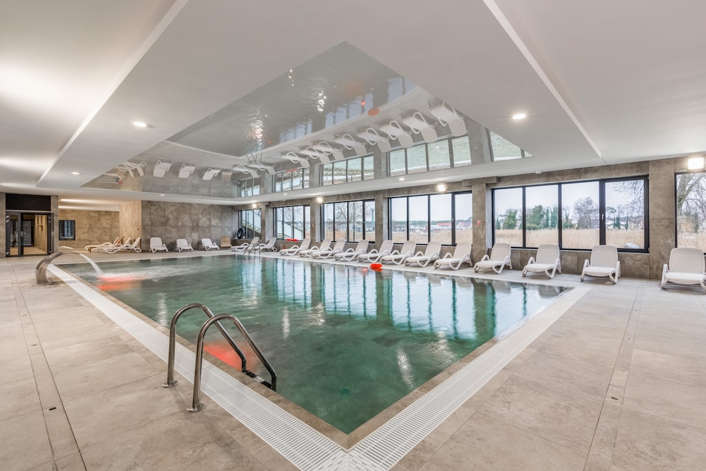 Indoor swimming pool with a children's wading pool, jacuzzi and saunas.