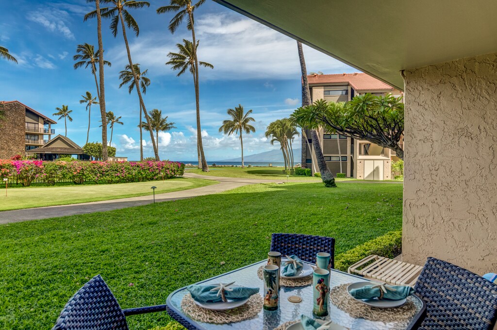Dine alfresco at Papakea B-105 with ocean views just steps from your private lanai.