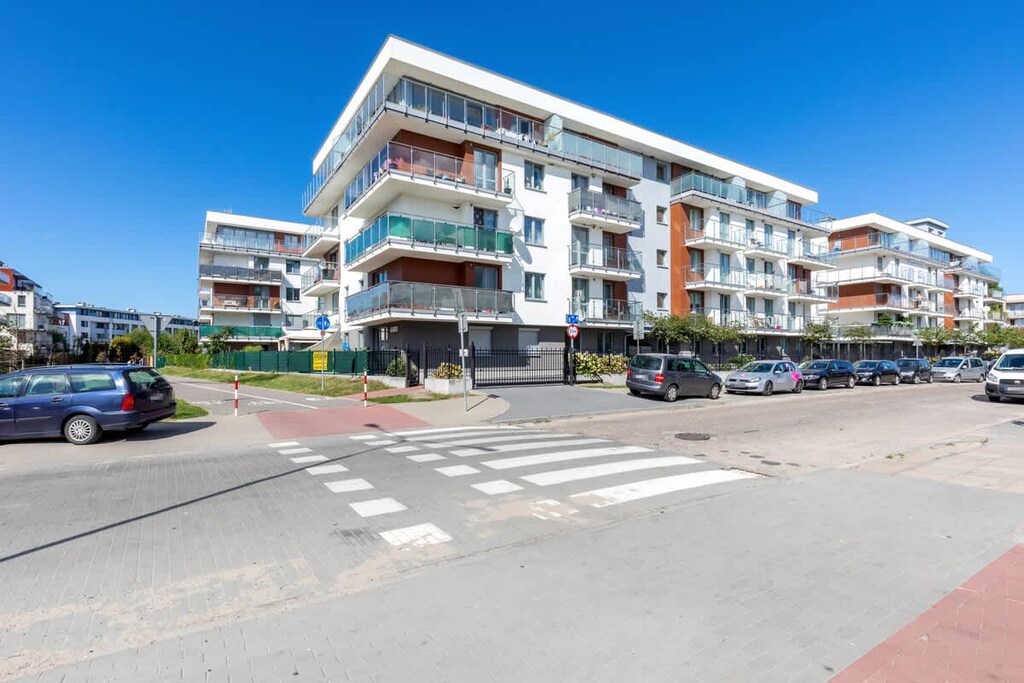 Modern and stylish property building situated close to many amenities such as stores and beach.