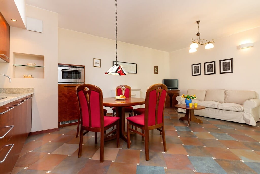 Living room with a comfortable sofa and TV. 